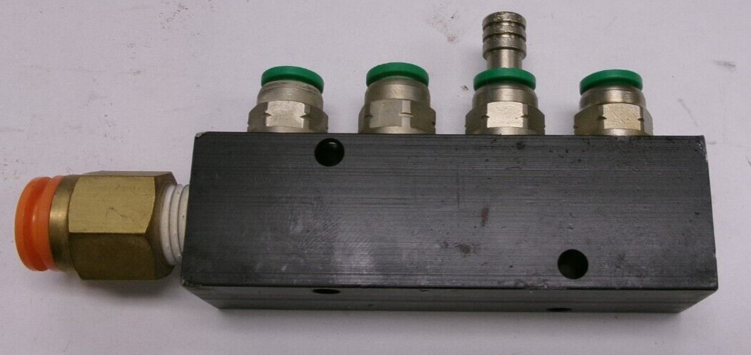 4-Port Manifold w/ (1) SMC Spore 3/8, (4) Numatics 1/4 Fittings included #T1111S