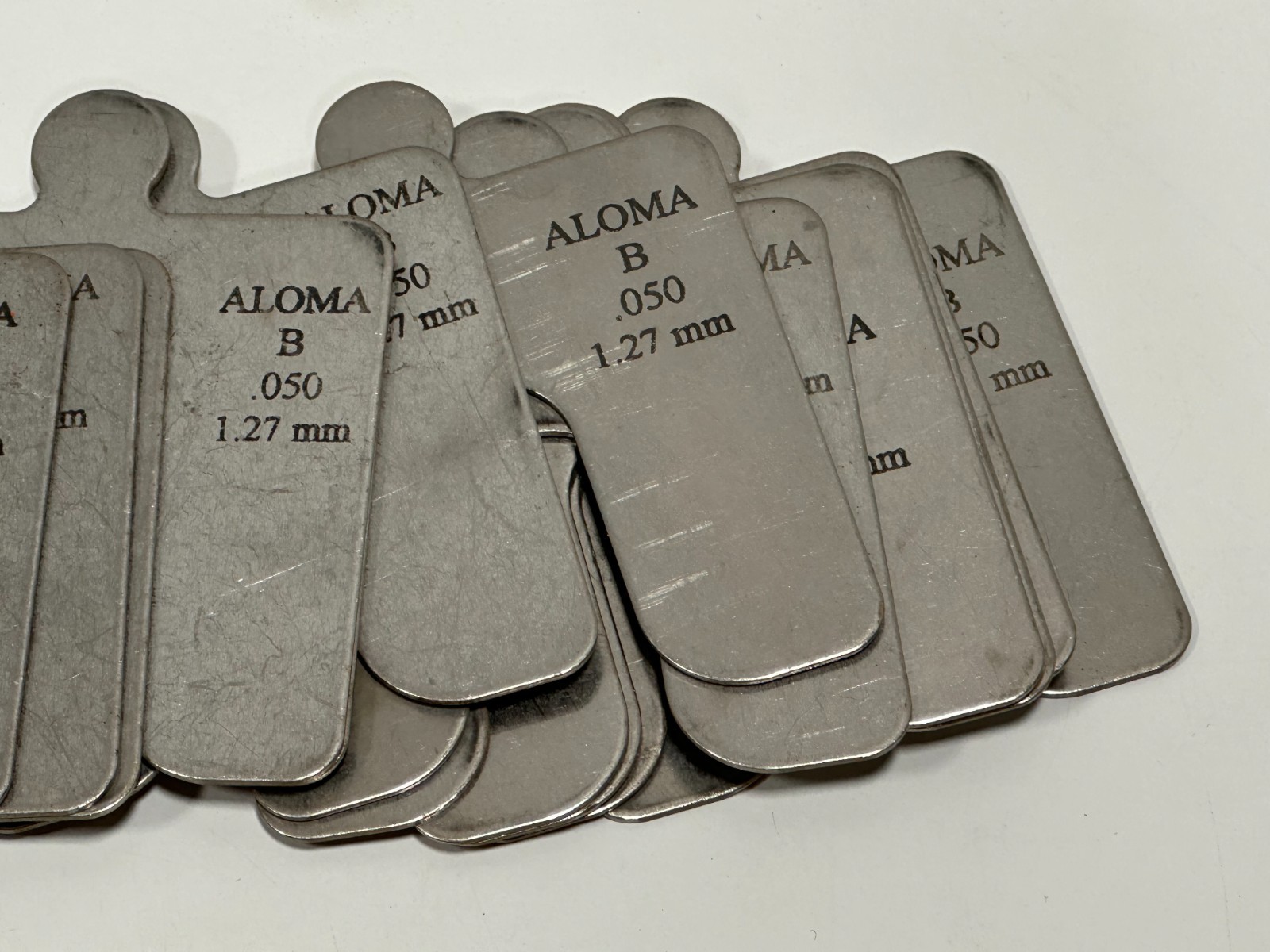 ALOMA SIZE B- 0.127” / 1.27mm THICK STAINLESS STEEL SLOTTED SHIMS lot of 14