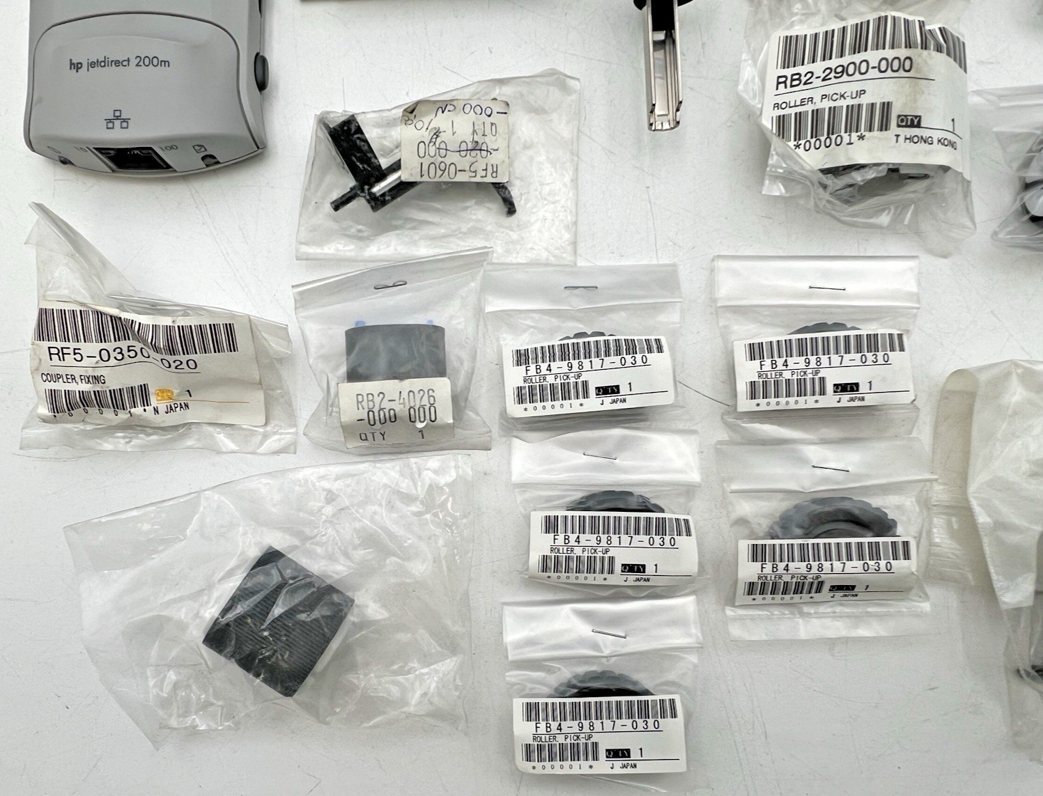 HP HEWLETT PACKARD LASERJET 4 AND OTHERS PARTS ROLLERS PICK-UP ARMS HOLDERS ETC