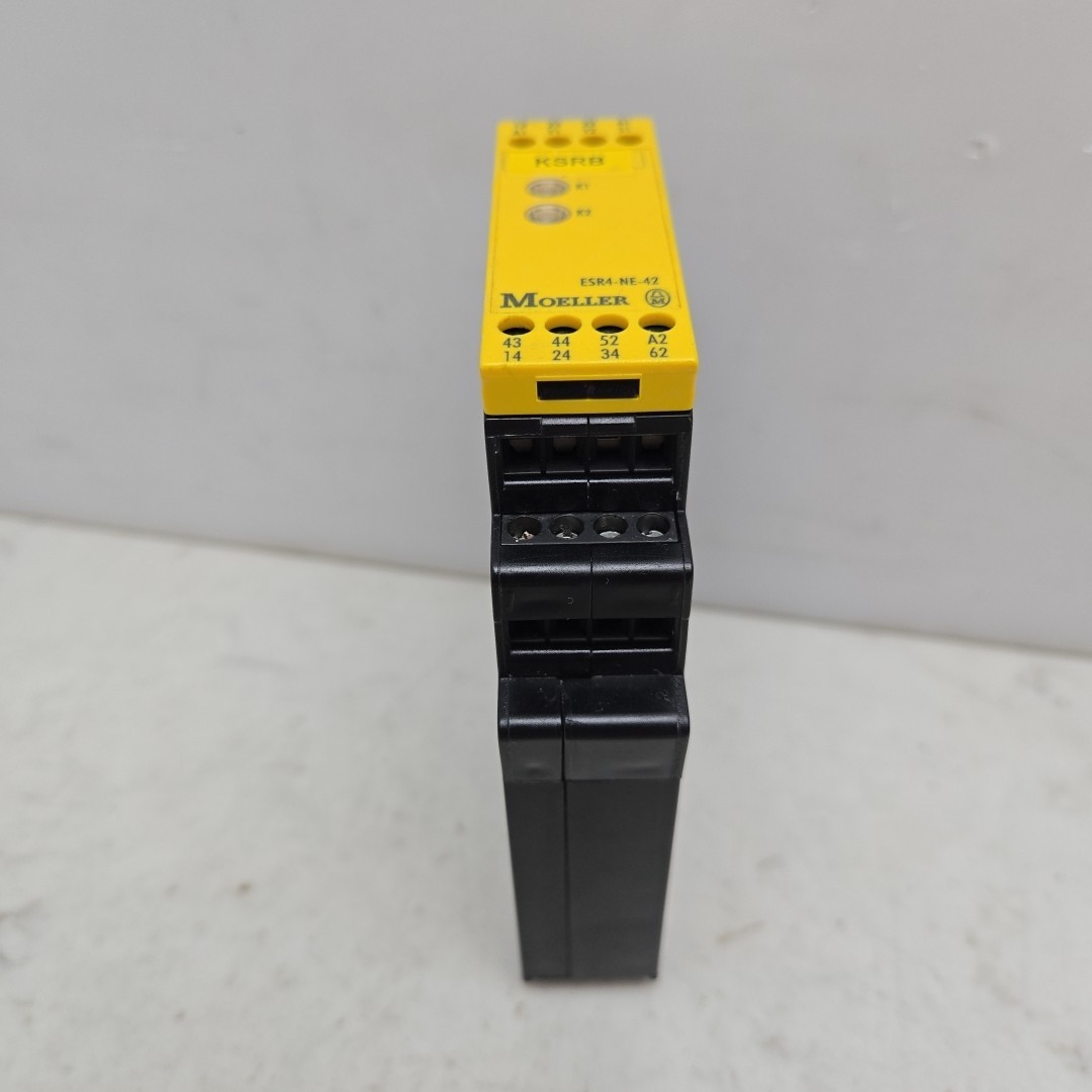 Moeller ESR4-NE-42 Safety Relay 24V Ac/Dc 50/60Hz 230Vac 6A 18815601 Used See Pi
