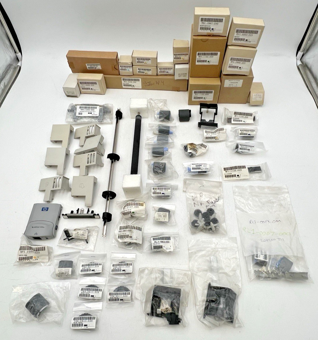HP HEWLETT PACKARD LASERJET 4 AND OTHERS PARTS ROLLERS PICK-UP ARMS HOLDERS ETC
