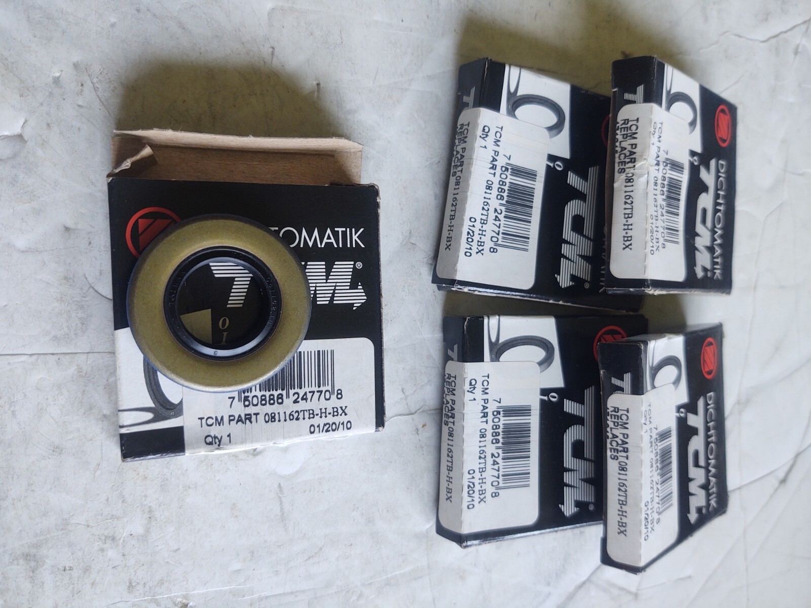 (5) TCM # 081162TB-H-BX / OIL SEAL. (.813 SHAFT, 1.624 BORE, .25 WD).