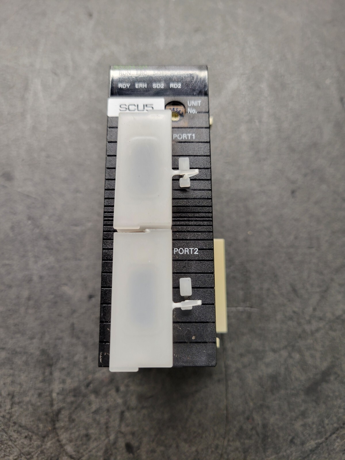 Omron CJ1W-SCU21-V1 Communication Module.
