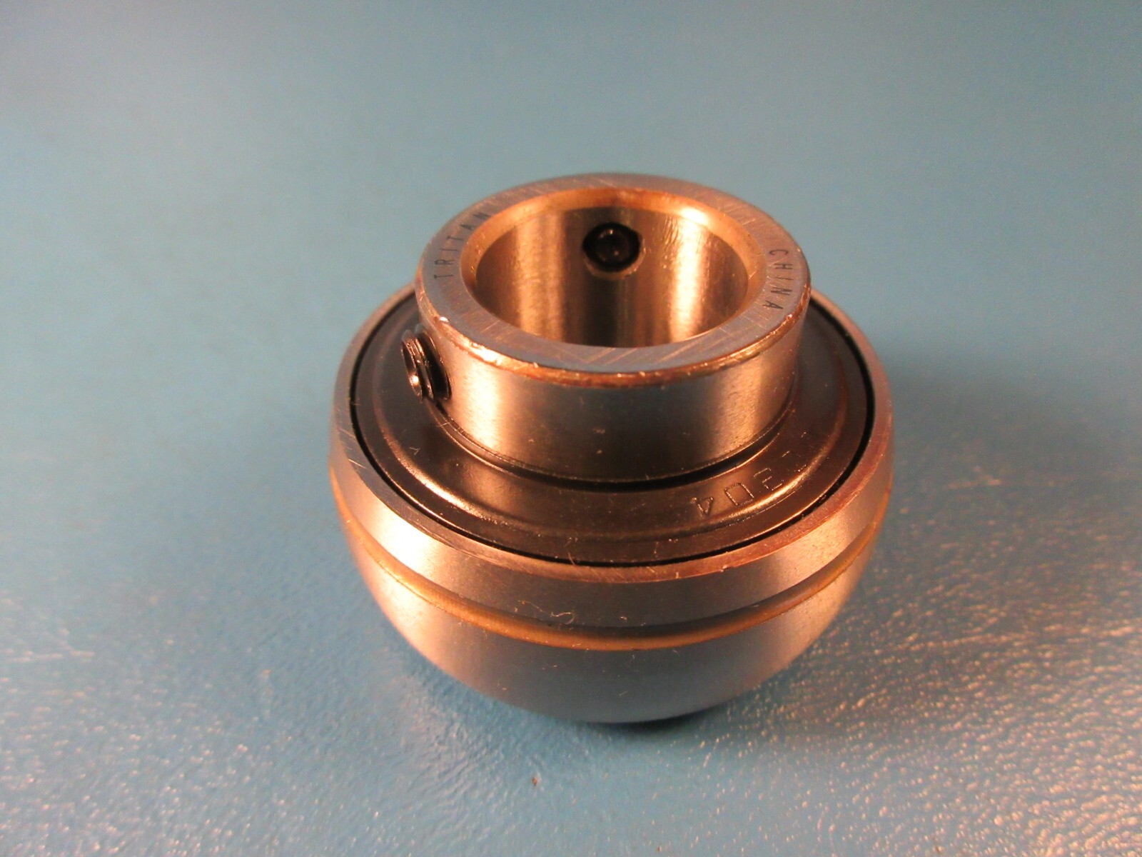 TRITAN UC204-20MM, 20 mm Bore, 47 mm OD, 17 mm Outer Ring Wide, Set Screws