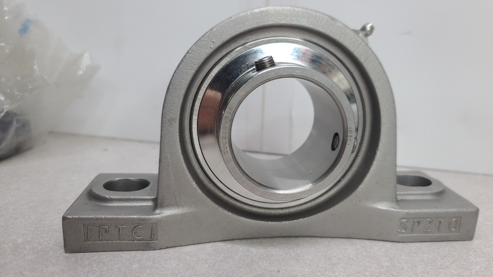 IPTCI SP210 SS Bearing Housing W/ SUC210-32g 2″ Bearing