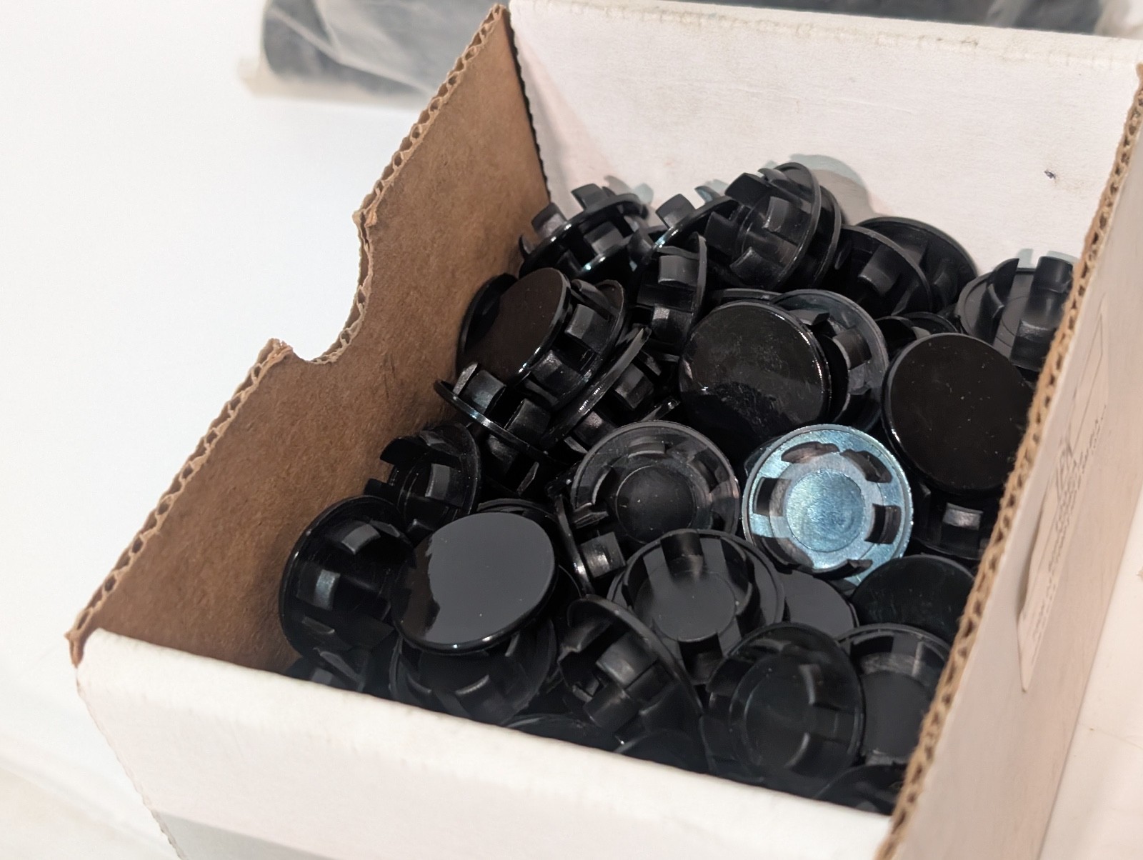 Lot of Approx. 700 Assorted Plastic Caps and Car Plugs, Various Sizes