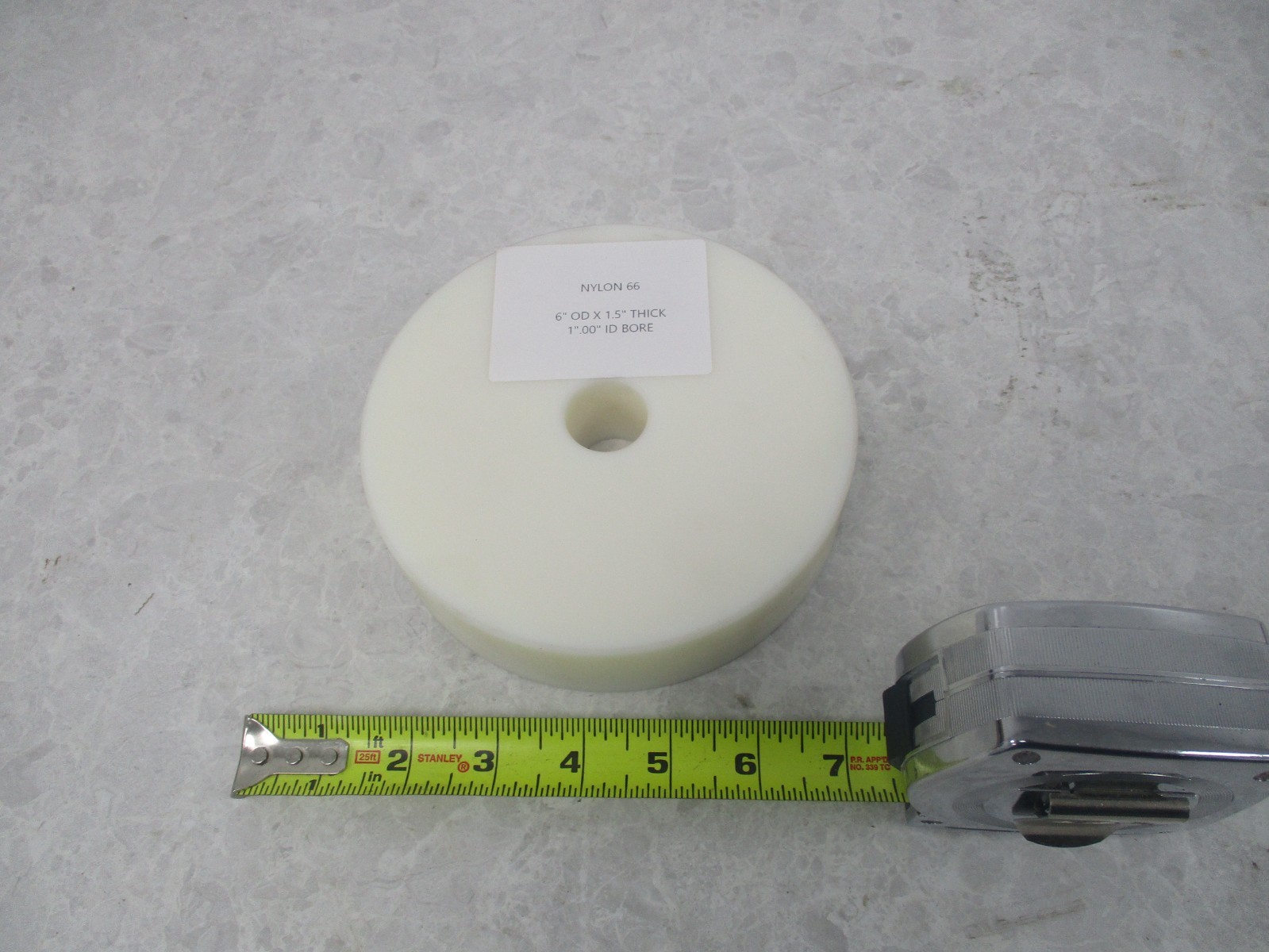 NYLON 66 6″ OD X 1.5″ THICK 1.00″ ID BORE, AB0143