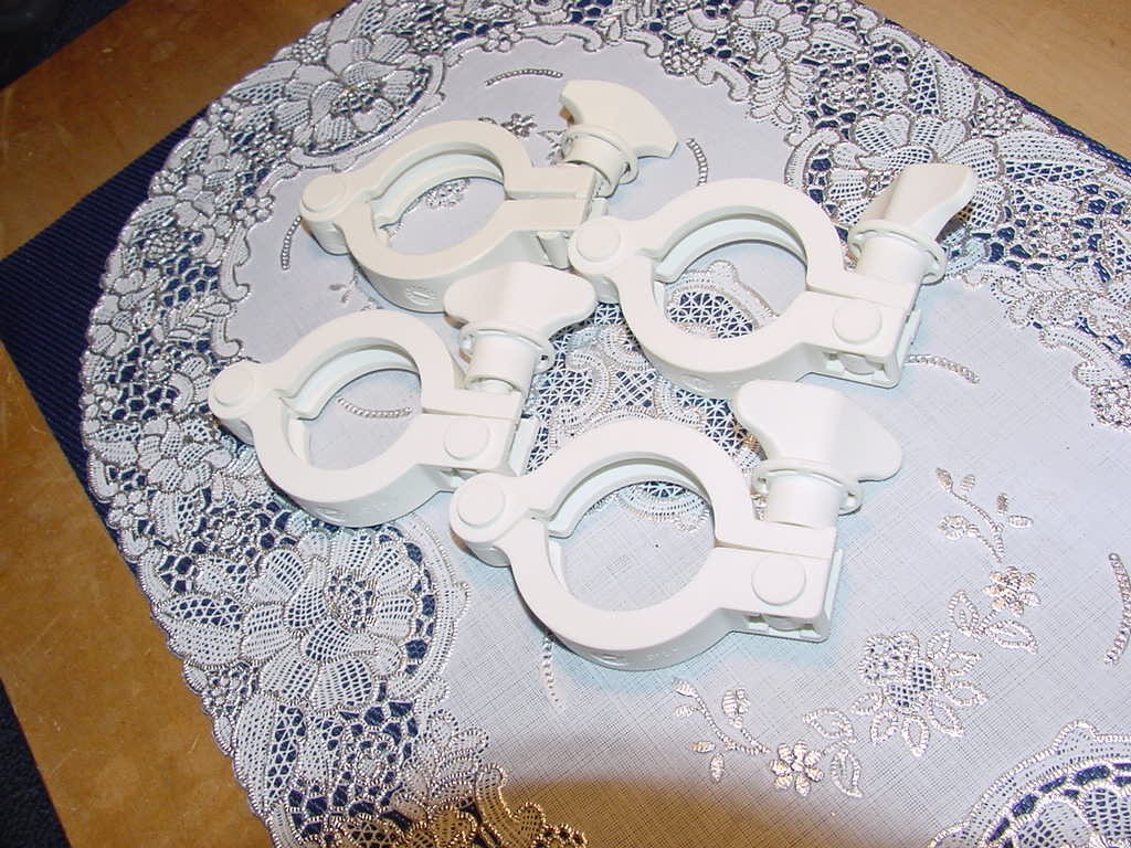 Four (4) MasterFlex 31201-44, 1.5-inch Non-Metallic Sanitary Hinged Clamps Used