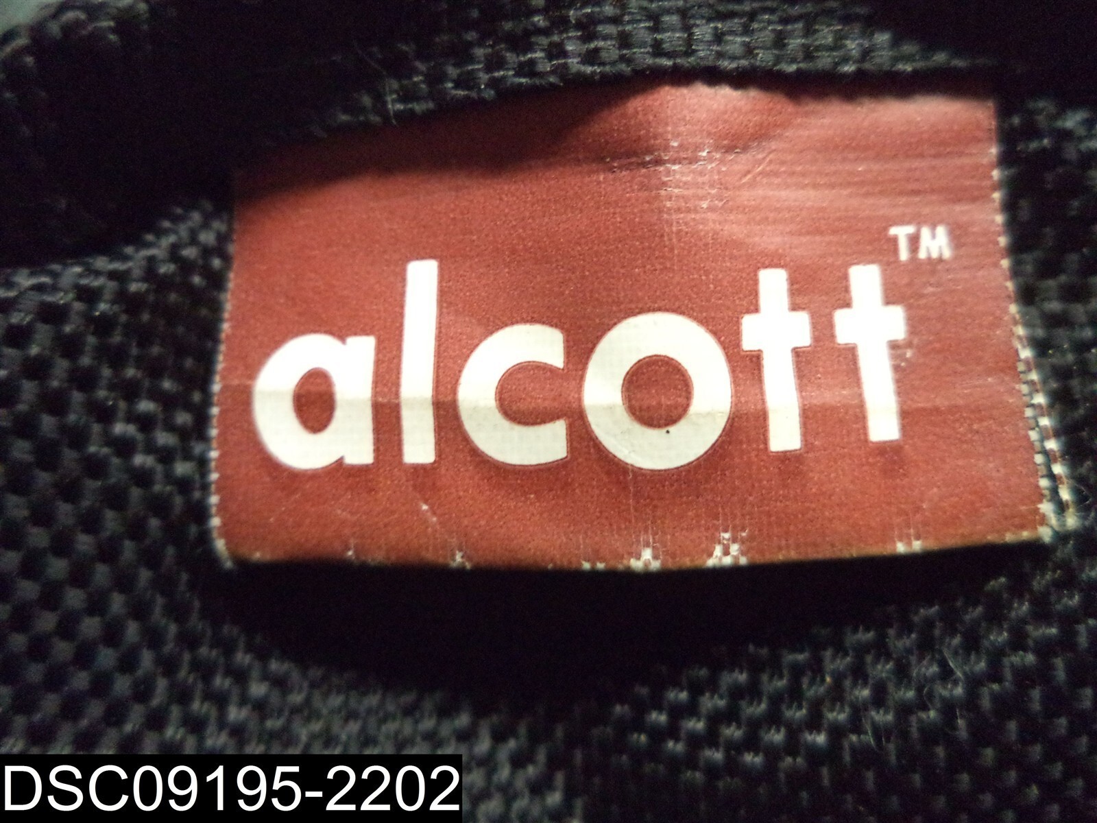 Used: Small Tear: Alcott 2 strap Travel Bag
