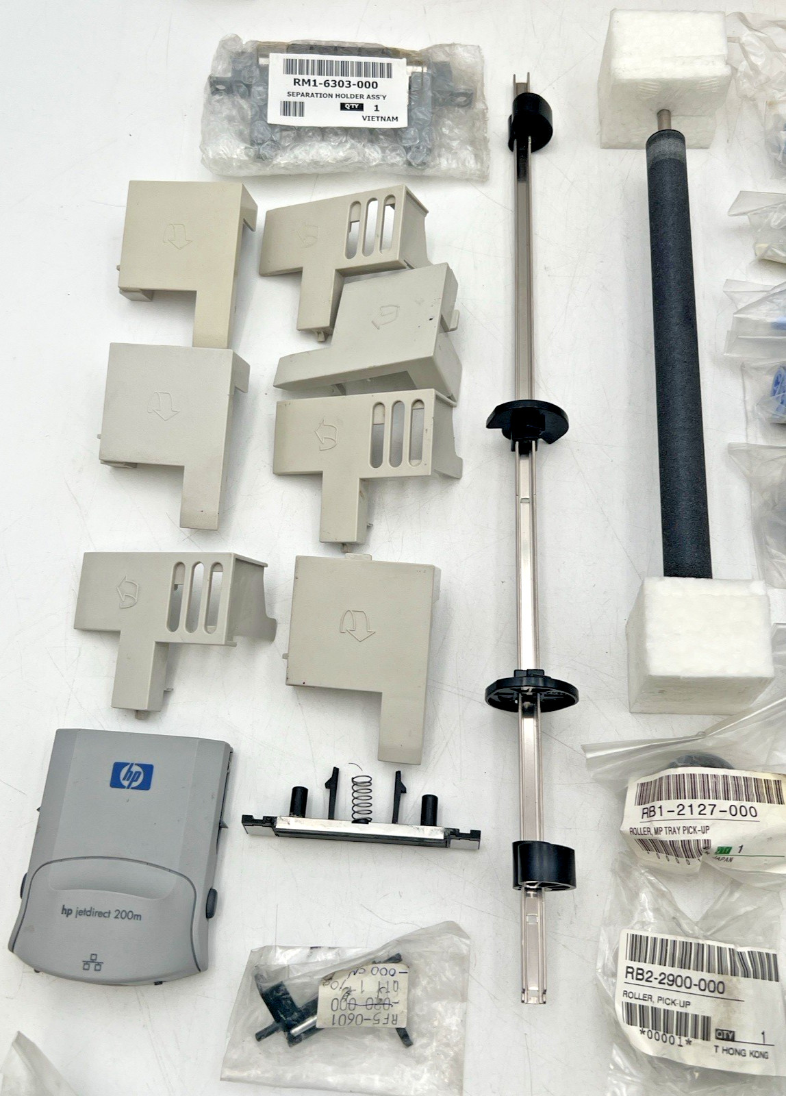 HP HEWLETT PACKARD LASERJET 4 AND OTHERS PARTS ROLLERS PICK-UP ARMS HOLDERS ETC