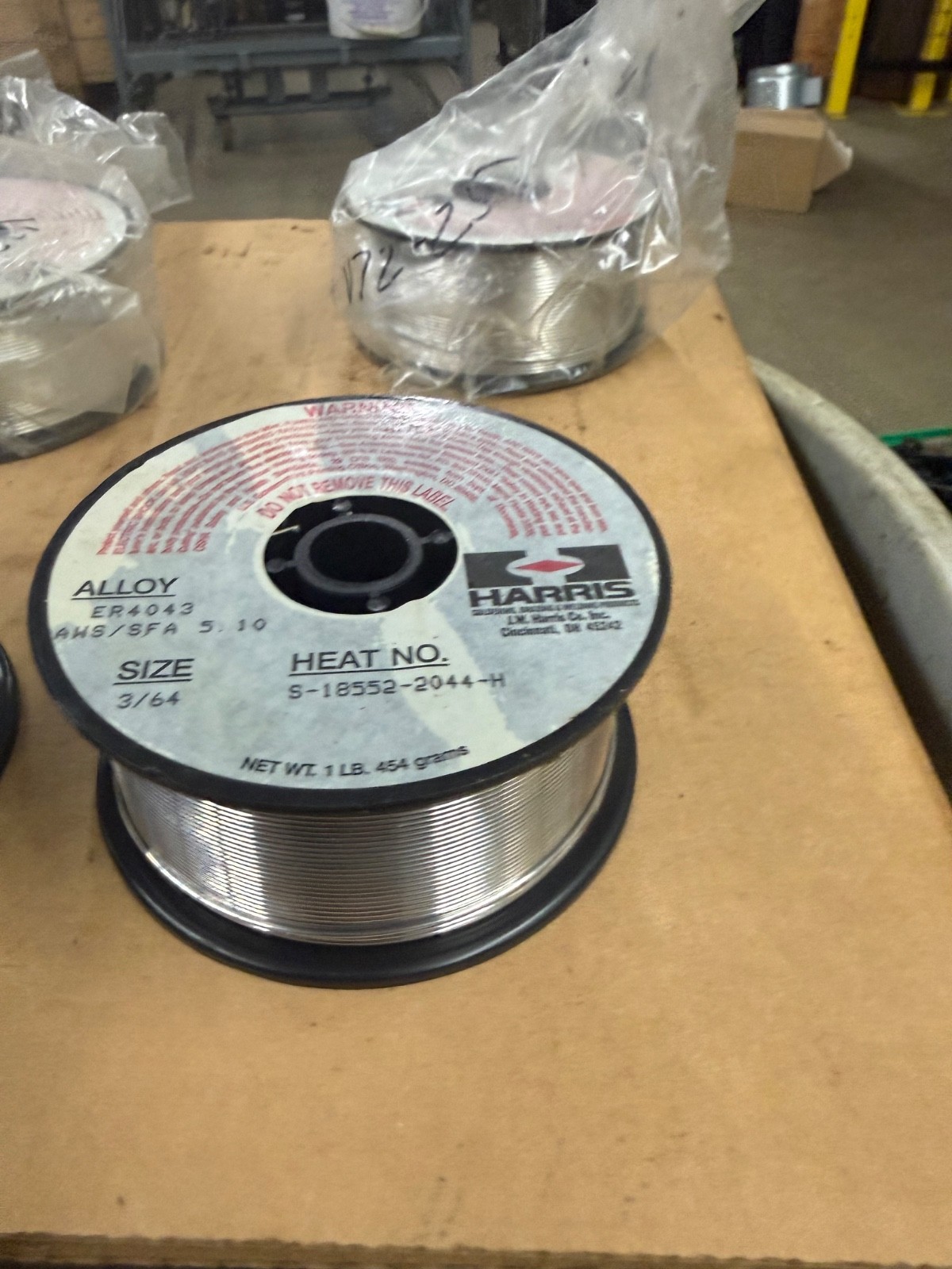 1 Ib spool of Harris brand ER4043 aluminum welding wire.