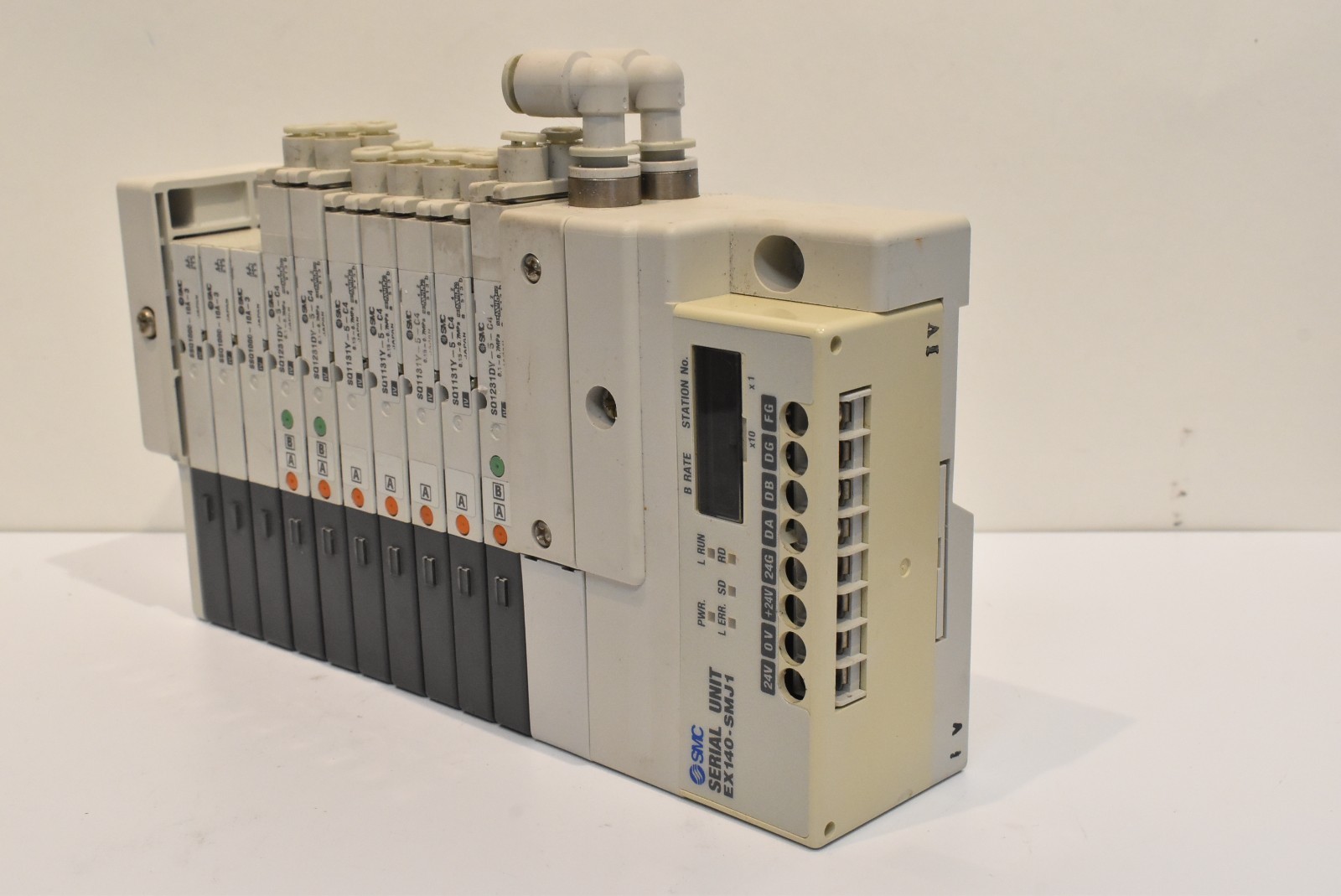 SMC manifold w/ EX140-SMJ1 and SQ1231DY-5-C4, SQ1131Y-5-C4.SSQ1000-10A-3 valves