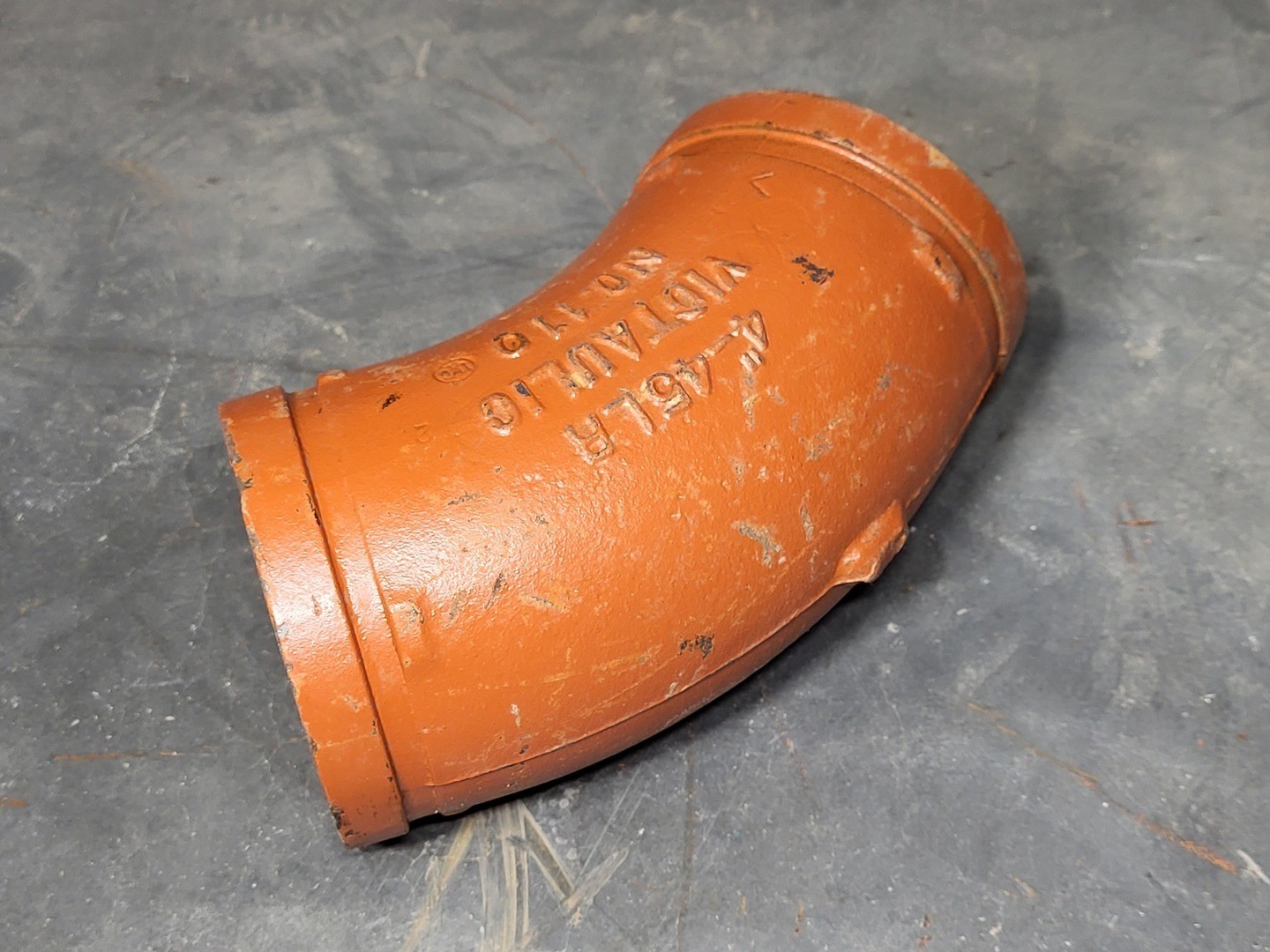 SURPLUS NEW Victaulic No. 110 6″ Grooved 45° Elbow Fitting, Ptd. Orange
