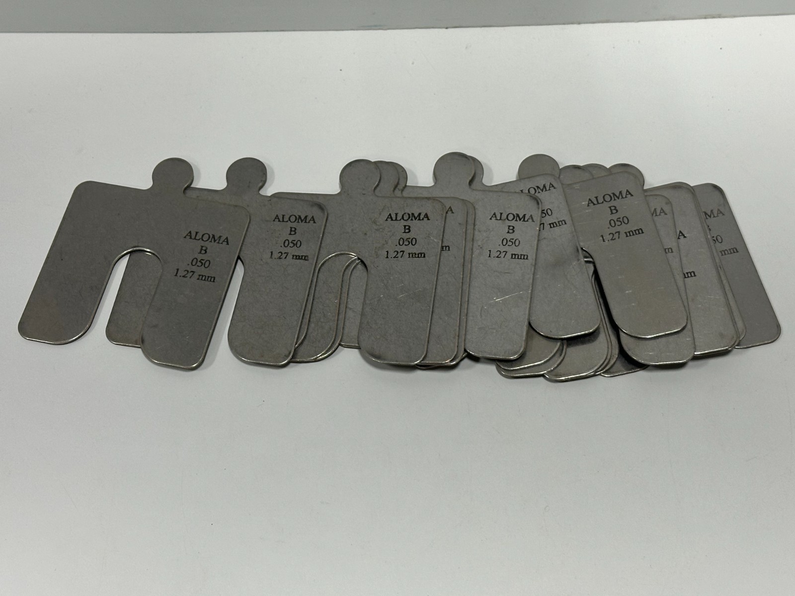 ALOMA SIZE B- 0.127” / 1.27mm THICK STAINLESS STEEL SLOTTED SHIMS lot of 14