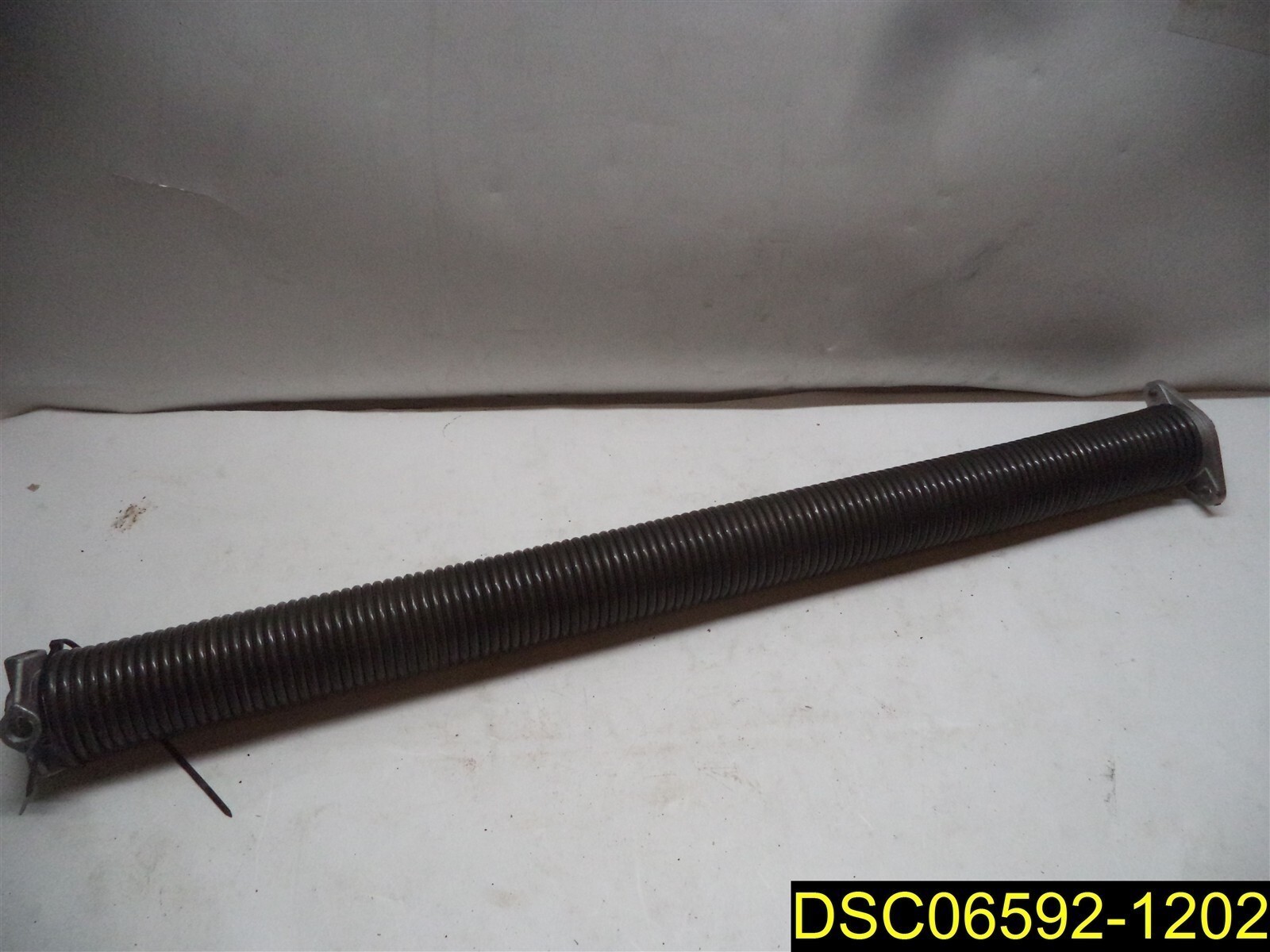 Overhead Door Spring Garage Door Spring 32 5/8″ overall length, 2 1/2″ OD,
