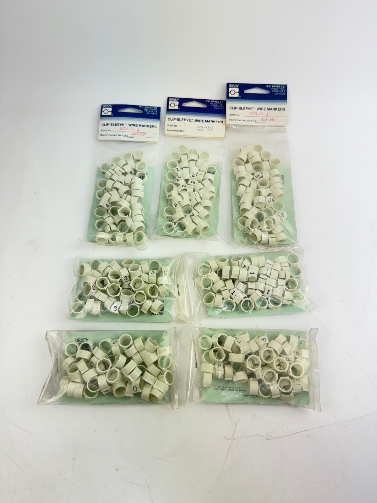 Lot of 7 Assorted Brady SCN-45 Clip-Sleeve Wire Markers 0, 1, 2, 3, 4, J, P