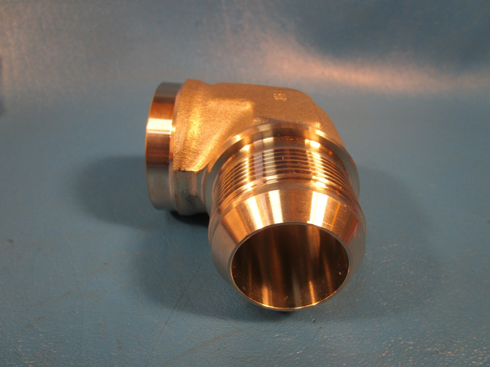 Brennan 2502-20-20SS, 90 Degree Elbow 1 1/4″ Female Pipe x 1 1/4 Male Flare