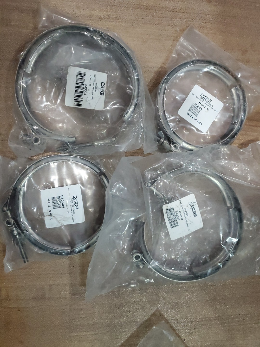 (4) MDC NW100 Banded Clamp ISO-LF Vacuum Clamp 540004 – Stainless – New Surplus