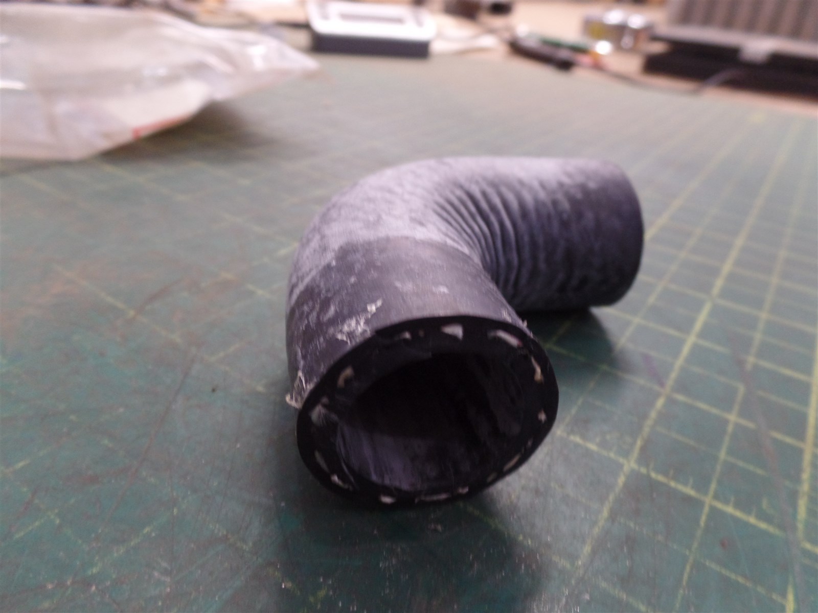 GENUINE TROJAN O&K 10209236900, 90° INTAKE HOSE,TEREX 10-209236900, NOS