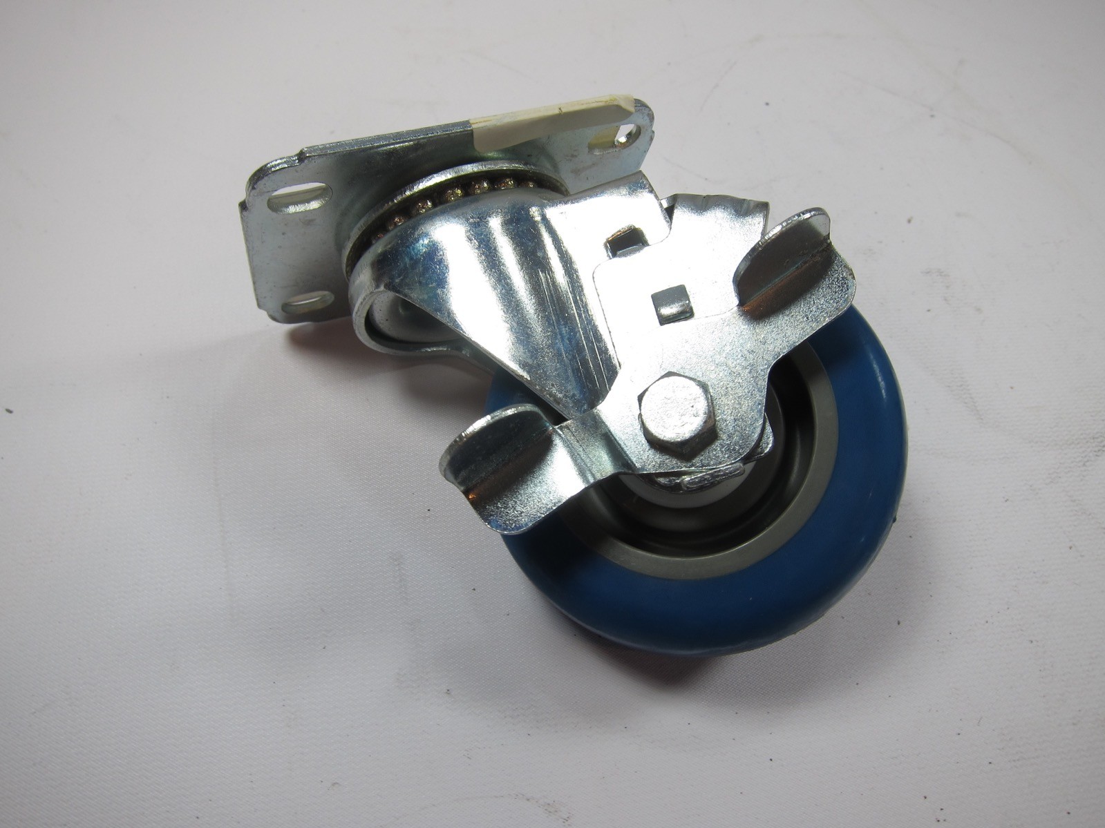 New 5UX86 3-1/2” Locking Light-Duty Swivel Plate Caster, 250 lb. Load Rating