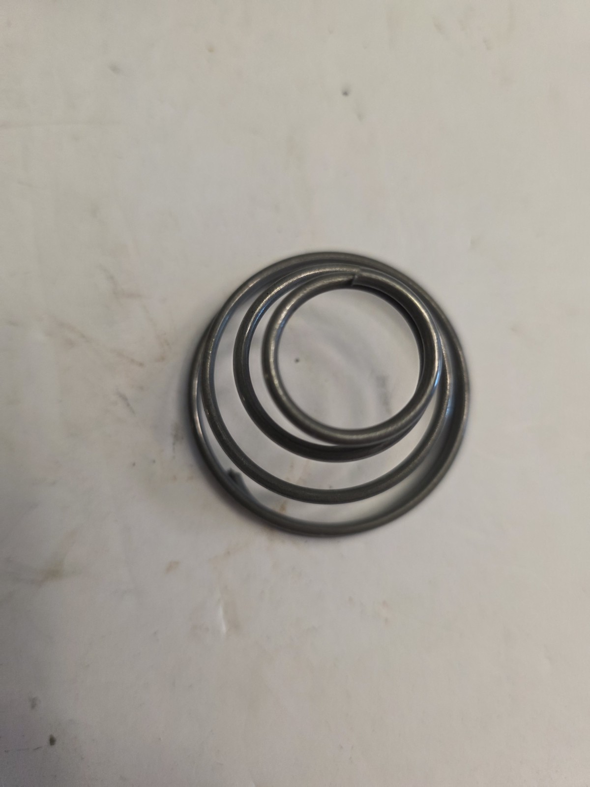 BOX OF 21 NOS AUVECO 1267 TENSION SPRINGS. INSIDE DOOR HANDLES