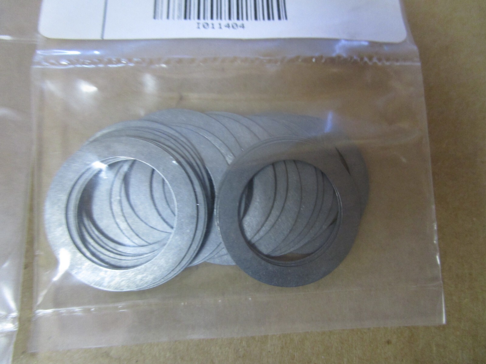 NEW LOT OF 100 McMASTER CARR SHIM RINGS 988-SPR STL-20X28X.3