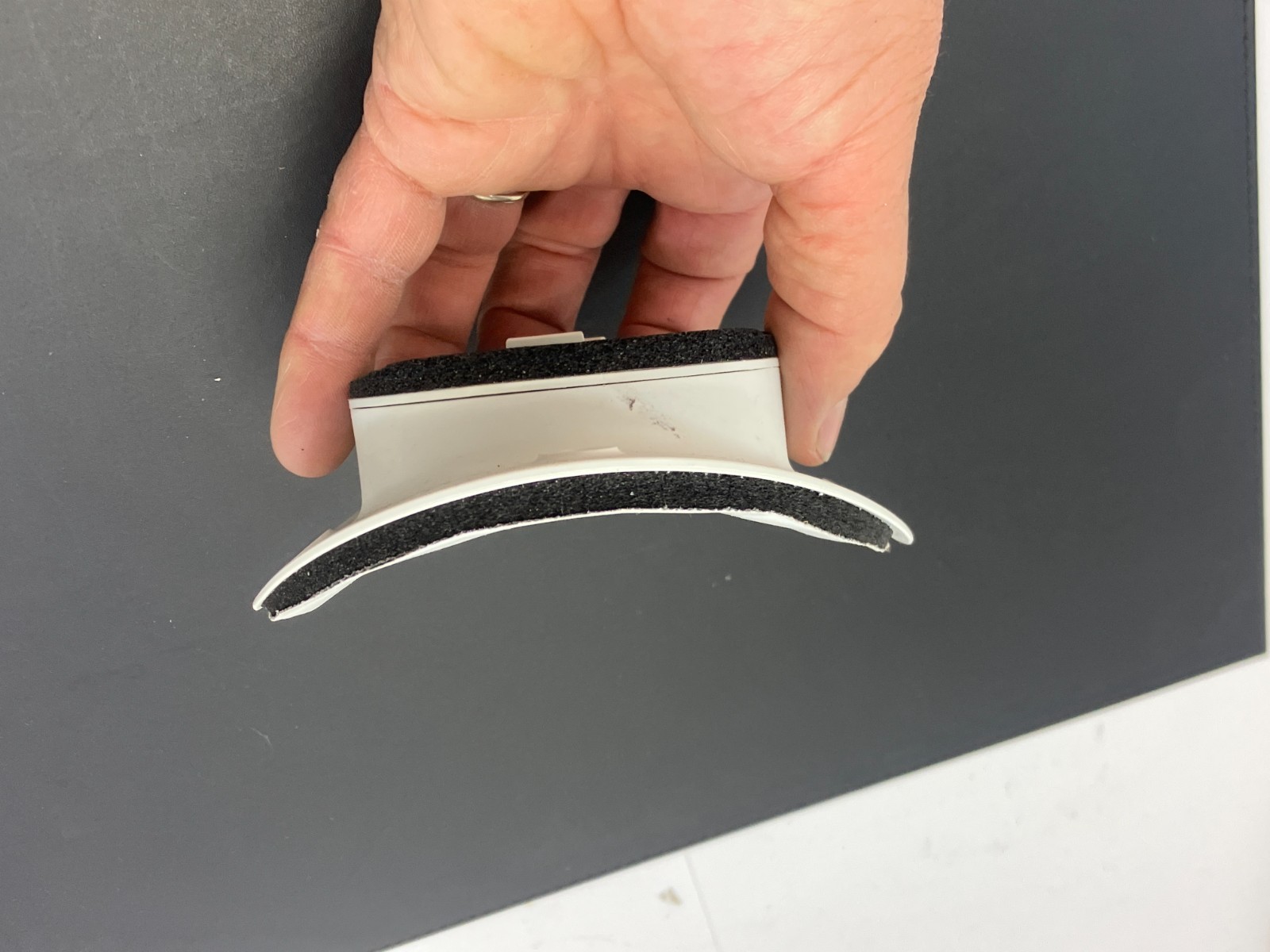 Unico System Saddle Style white round supply outlet for a high-velocity HVAC
