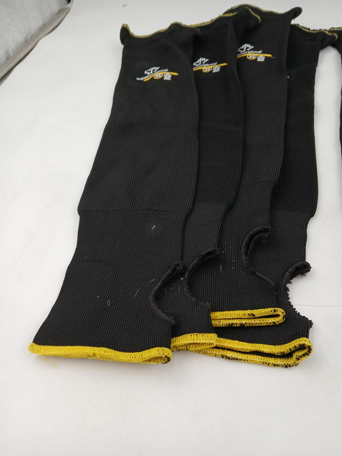 Superior Glove KP1T Cut A2 Arm Sleeves 5 Left 4 Right Thumb Hole Black Lot of 9