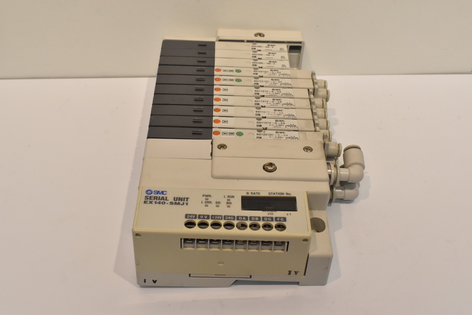 SMC manifold w/ EX140-SMJ1 and SQ1231DY-5-C4, SQ1131Y-5-C4.SSQ1000-10A-3 valves