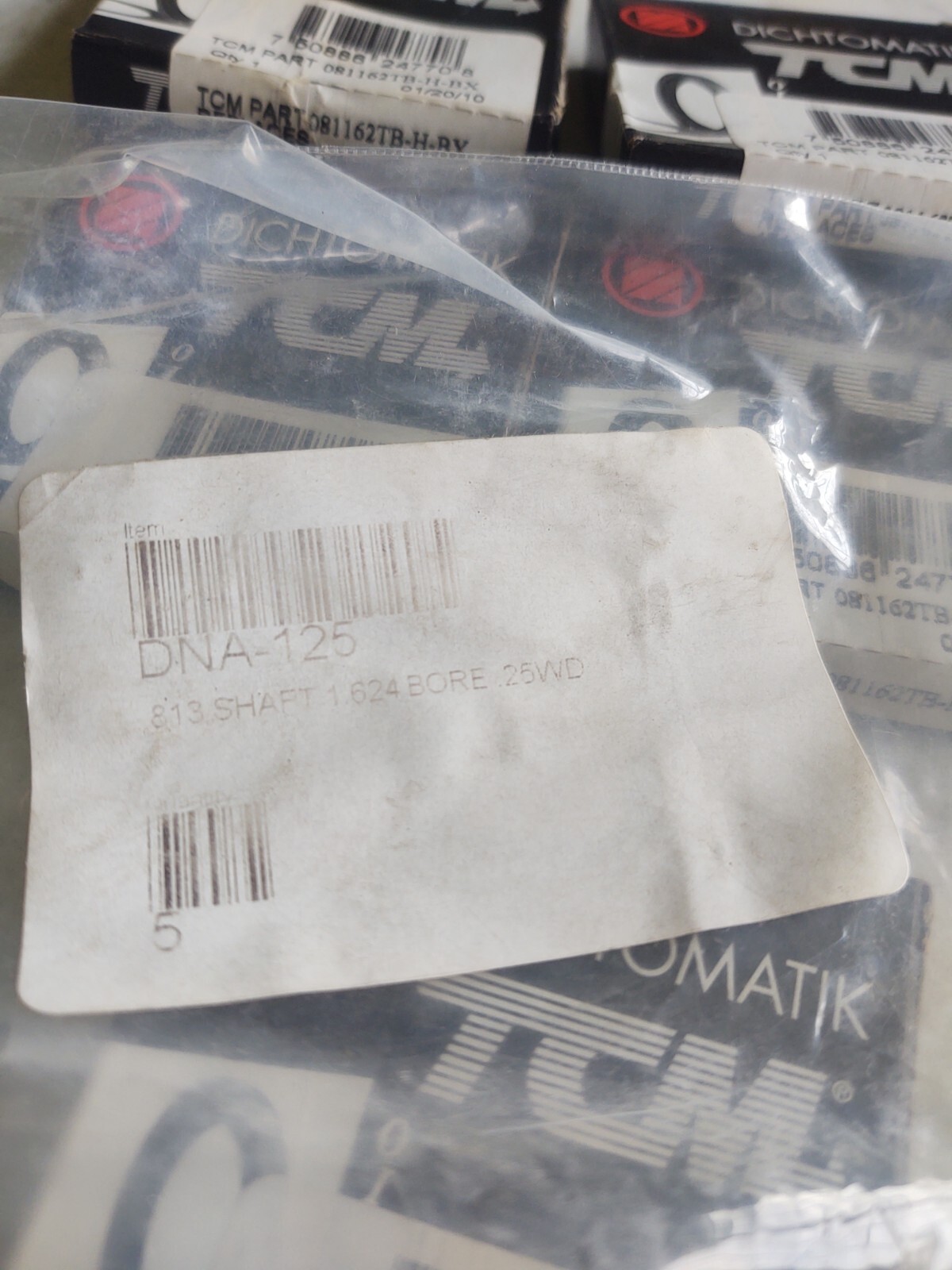 (5) TCM # 081162TB-H-BX / OIL SEAL. (.813 SHAFT, 1.624 BORE, .25 WD).