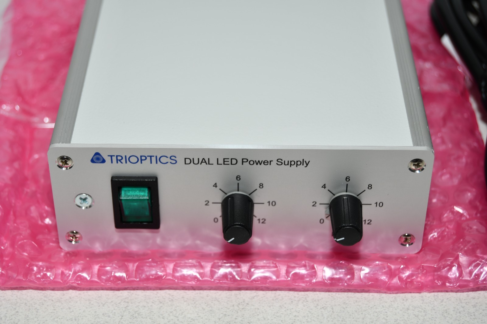 ^ Trioptics TRI-LED-S-01 LED Power Supply / Controller & LED Source (Green)