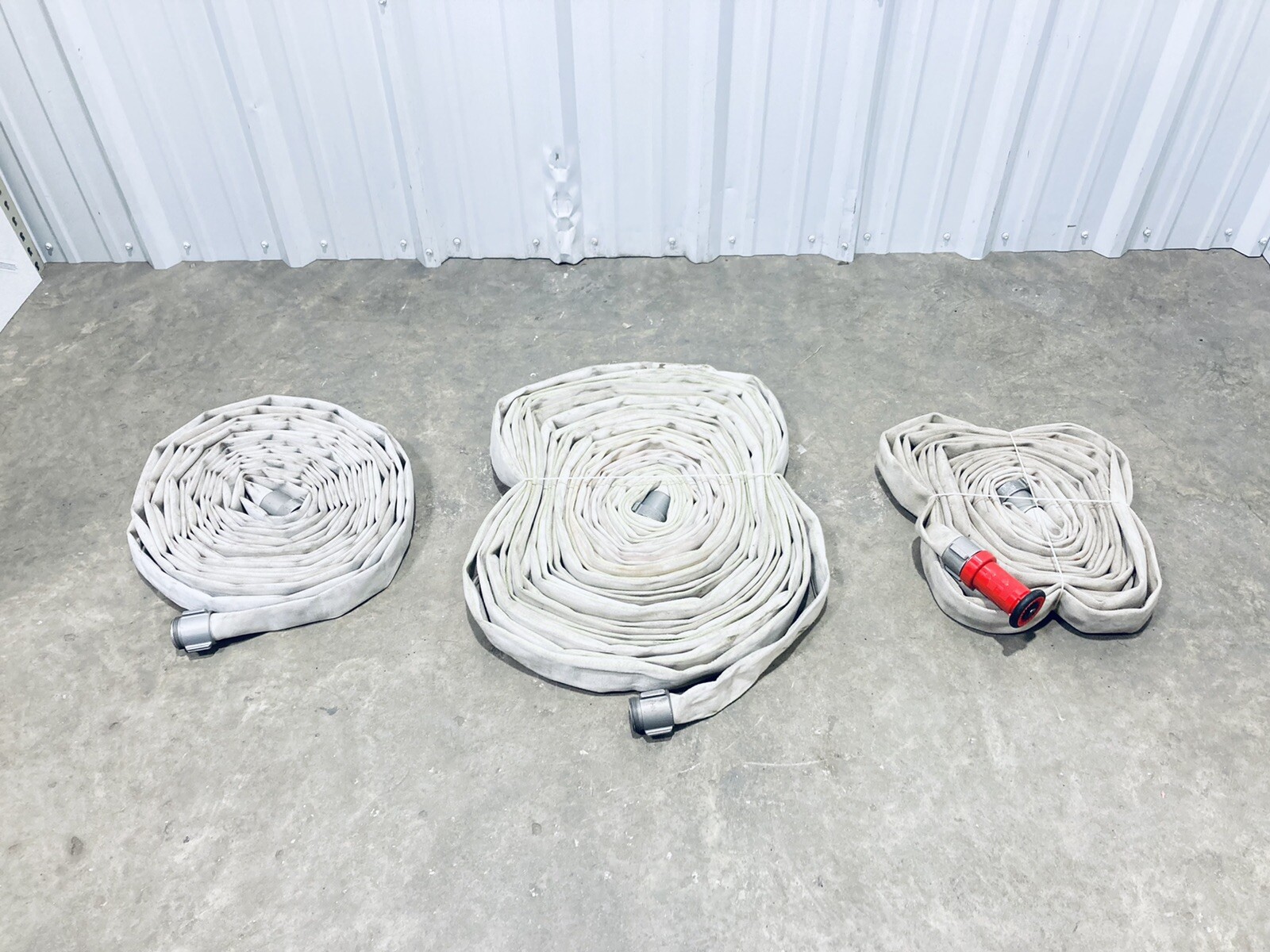 LOT OF 3 FOREST-LITE (2) 50-FT / (1) 100-FT FIRE EXTINGUISHING HOSES