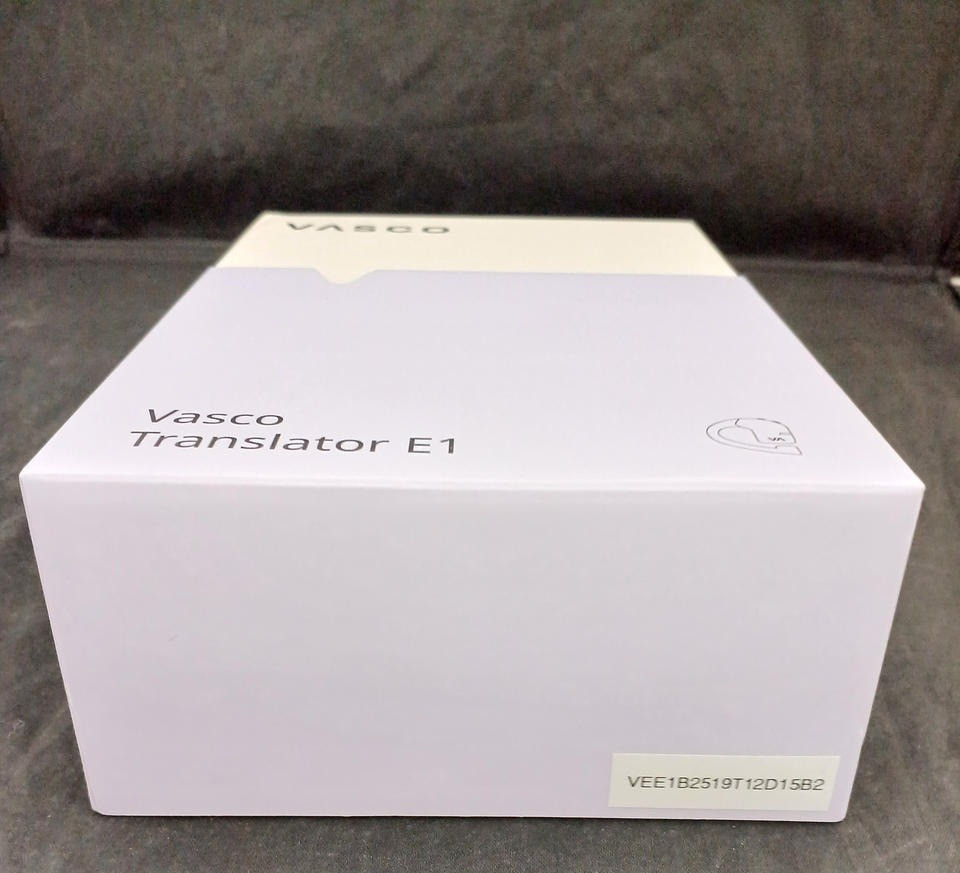 Used Vasco E1 earbuds Translator 50 languages with two earphones right side