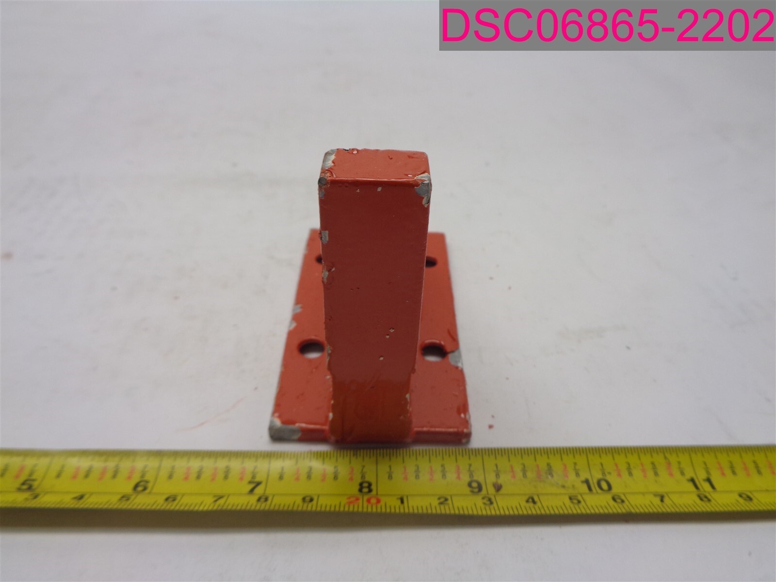 D9099-21 Red Metal Part. 3-5/8″x2″ Base. 3″ Tall.