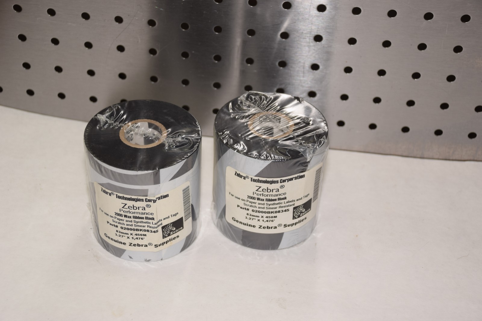 (LOT 2) ZEBRA TECHNOLOGIES 02000BK08345 83mm x 450m 2000 WAX RIBBON BLACK NEW