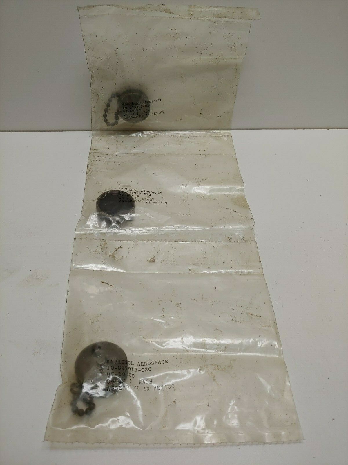 LOT OF (3) NEW OLD STOCK! AMPHENOL CIRCULAR CONNECTOR CAPS & CHAIN 10-825915-020