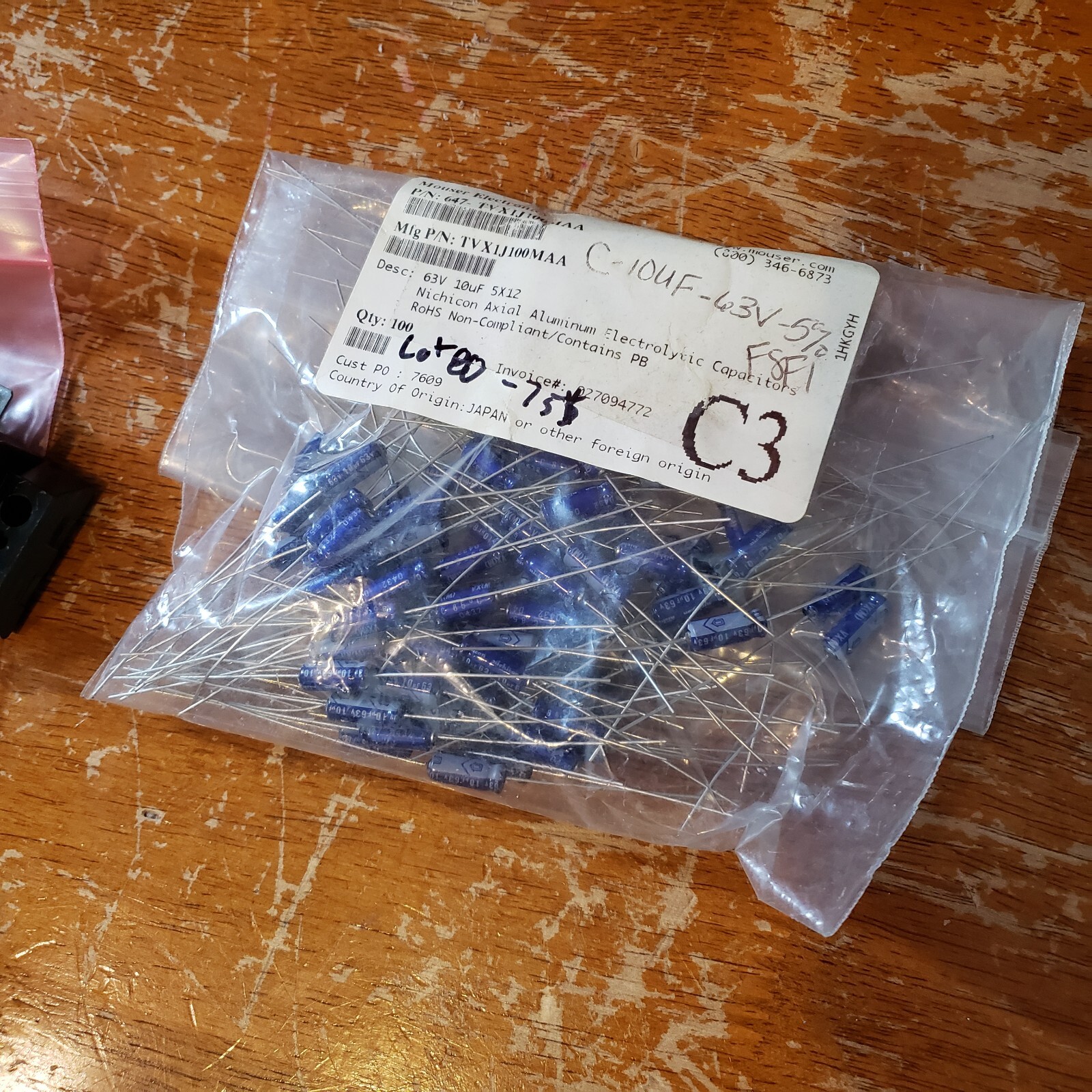 NEW LOT of 80 Nichicon Axial Aluminum Capacitors 63V # TVX1J100MAA C-10uF-63V-5%