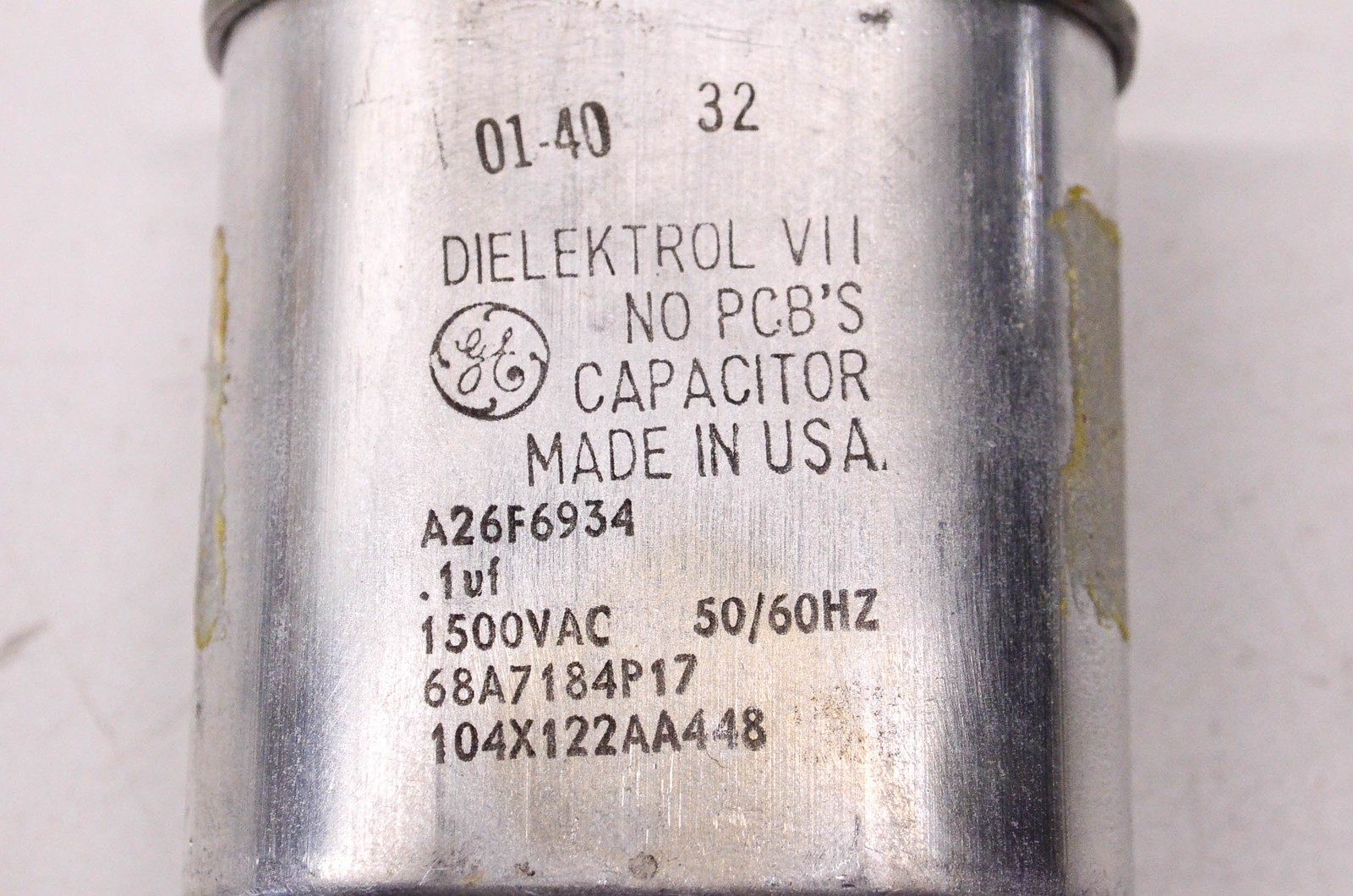 General Electric .1uF 1500 Volt AC 50/60HZ Capacitor W/ Hold Down Clamps NOS