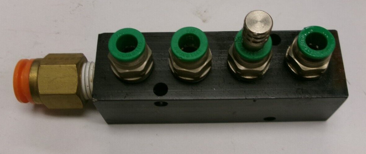 4-Port Manifold w/ (1) SMC Spore 3/8, (4) Numatics 1/4 Fittings included #T1111S