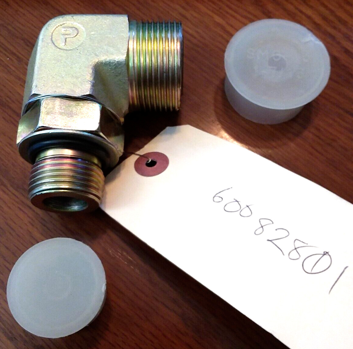 New Parker SMA-12, 1-1/16 Male X SMG-16, 1-7/16 Male 90 Degree Elbow Fitting
