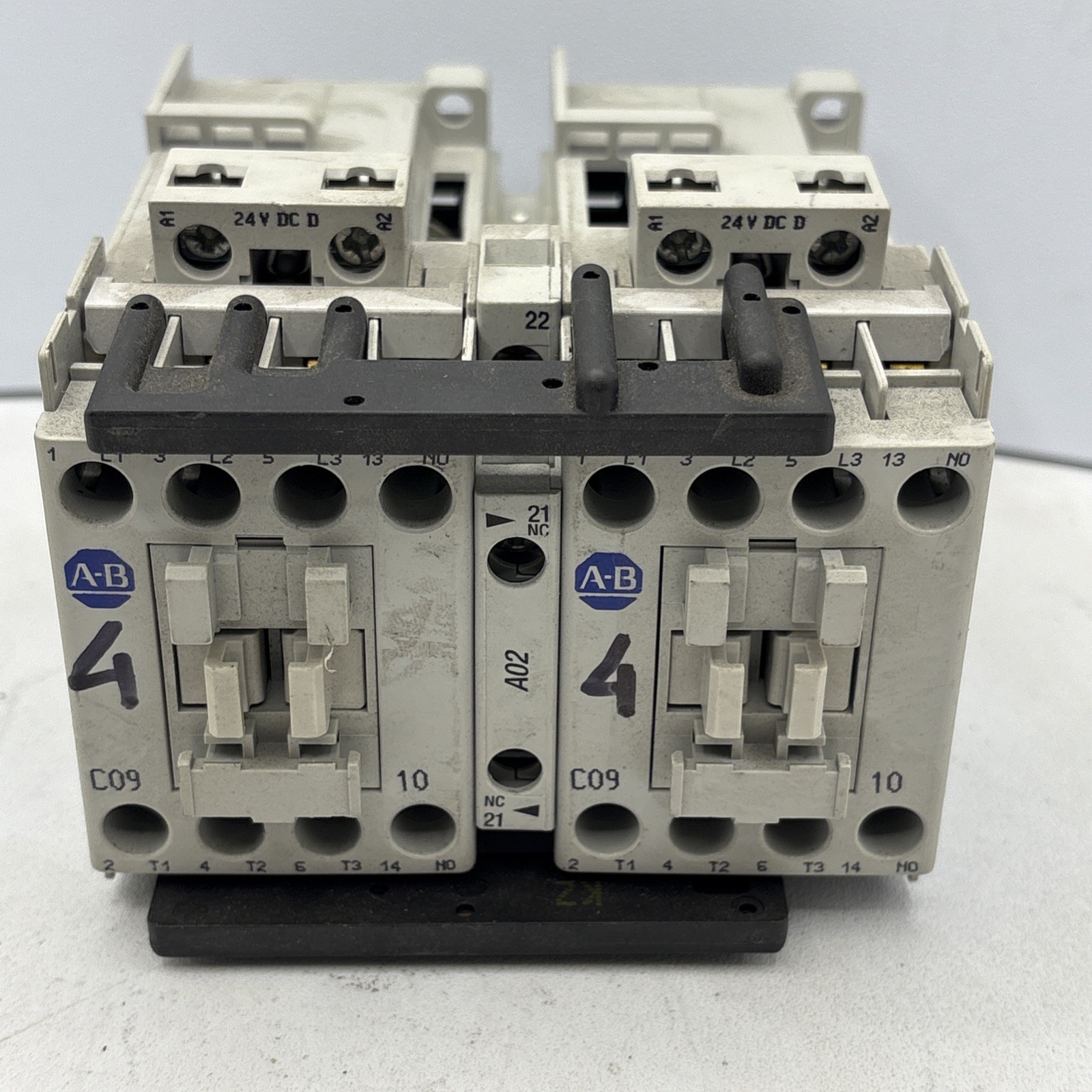 ALLEN BRADLEY 104-C09DJ22 B REVERSING CONTACTOR WITH 2 100-C09D*10 A Coils