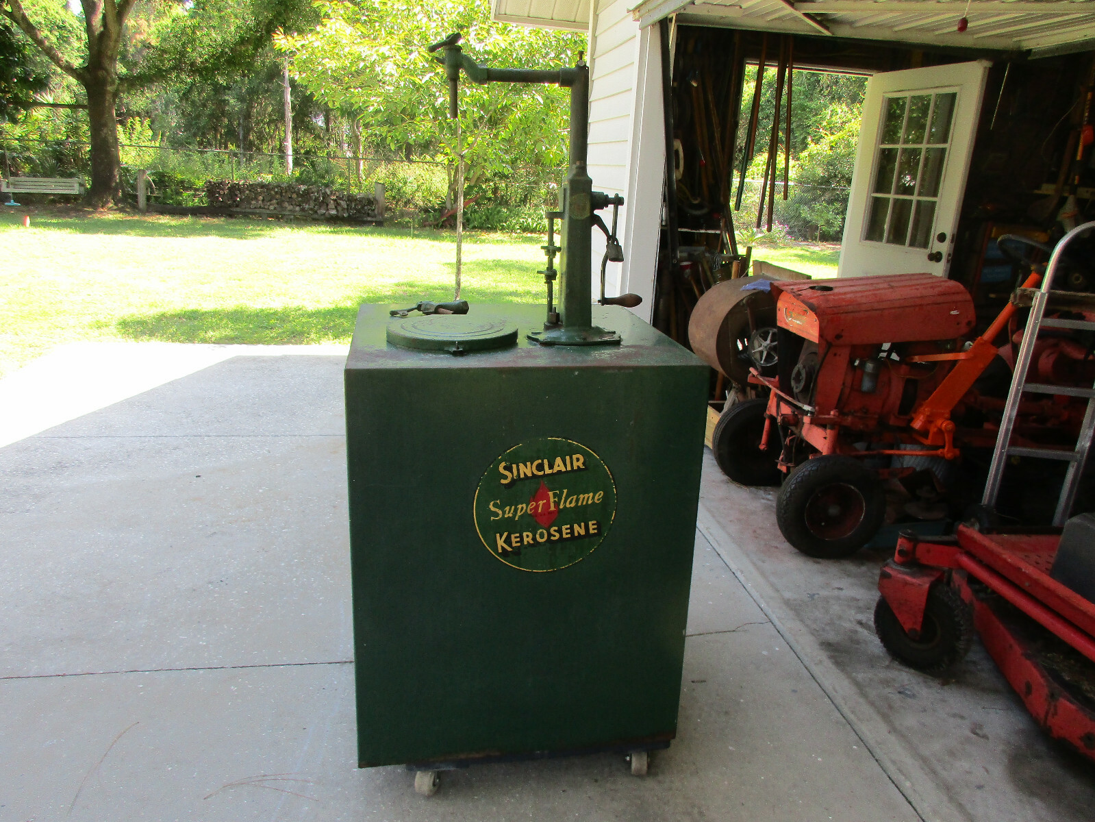 Sinclair kerosene oil tank with hand metering pump by Erie #2240, 120 gallon