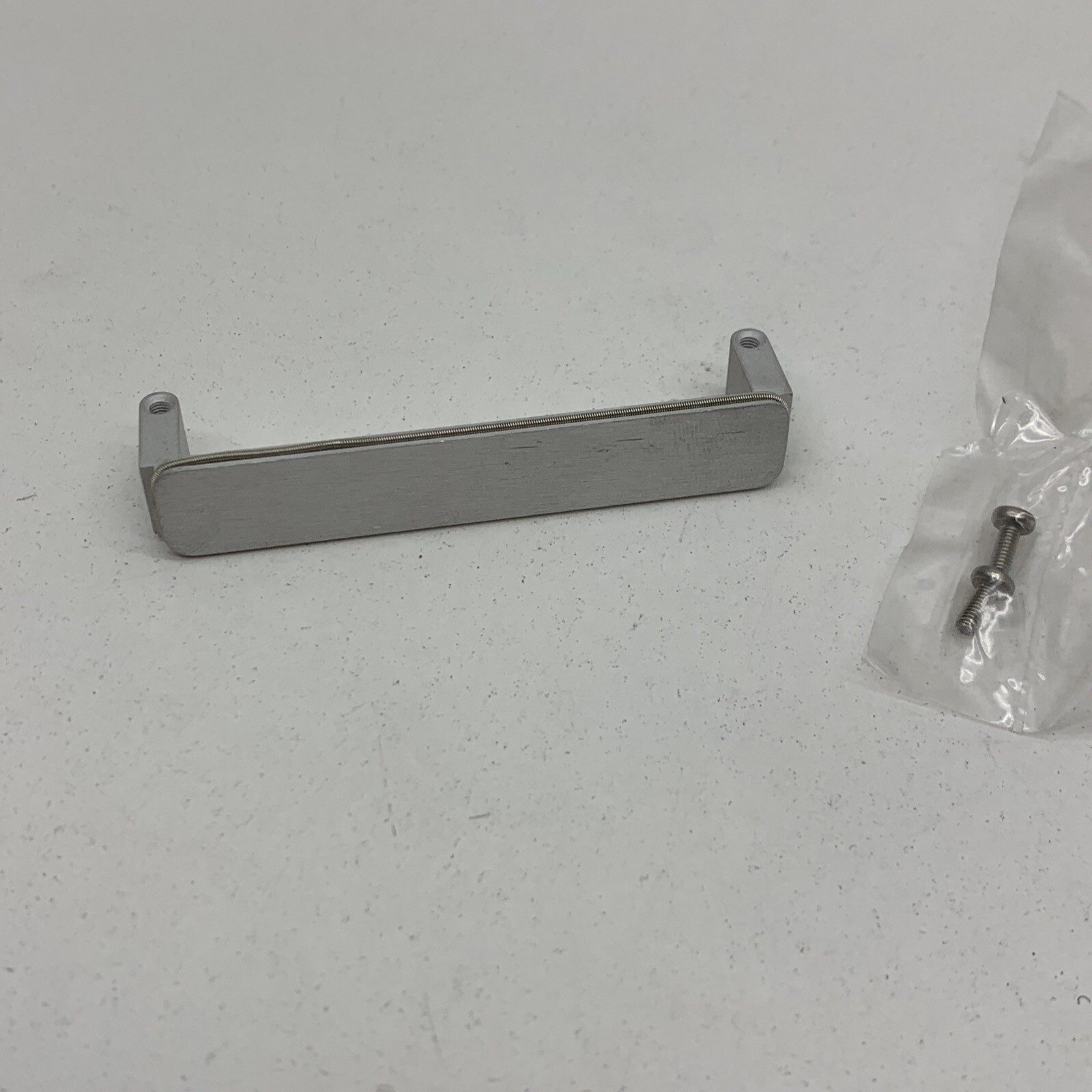 Emench Closure Plate