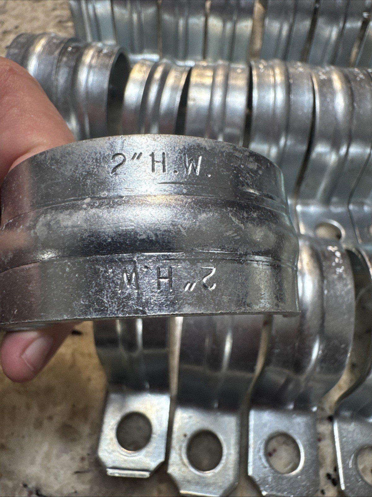 H.W. 2″ 1-Hole Pipe Strap Lot Of 22