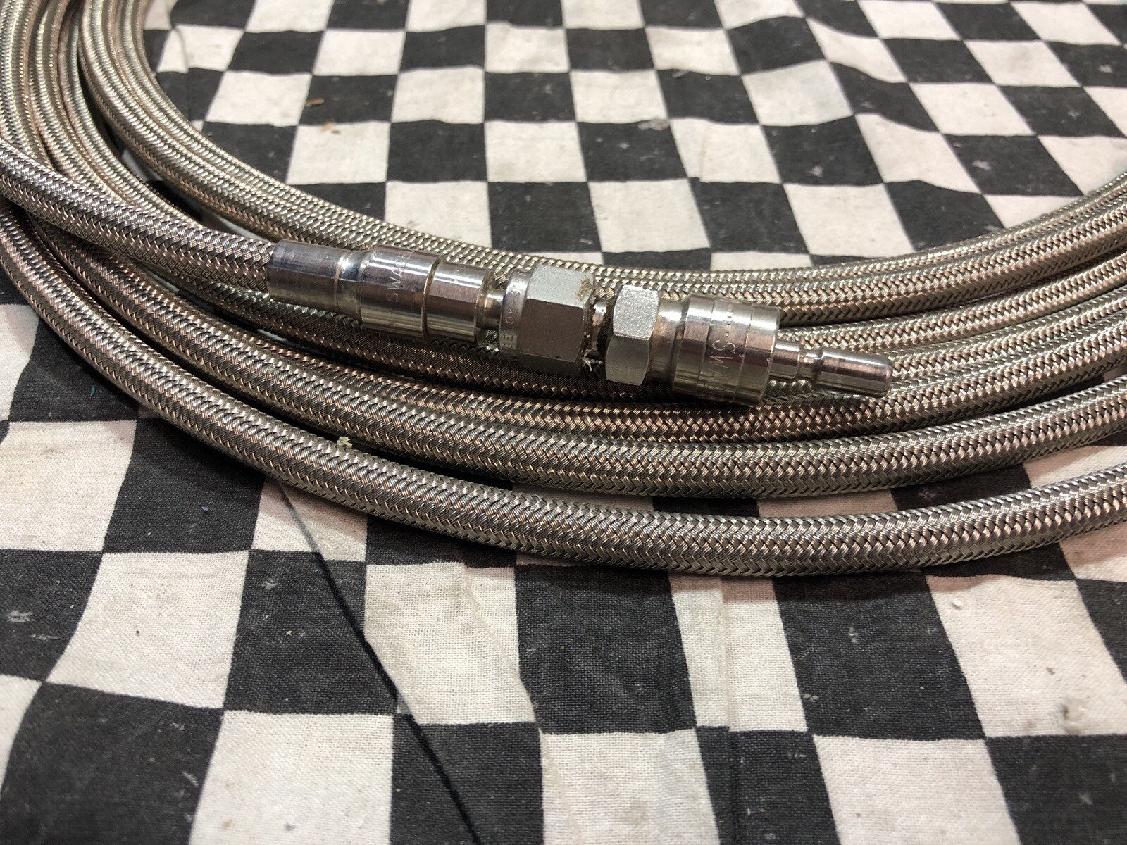 SWAGELOK BRAIDED HOSE 1/4″ X 25FT & QUICK CONNECTION SS-QC4-S-400 & SS-QC4-B-400