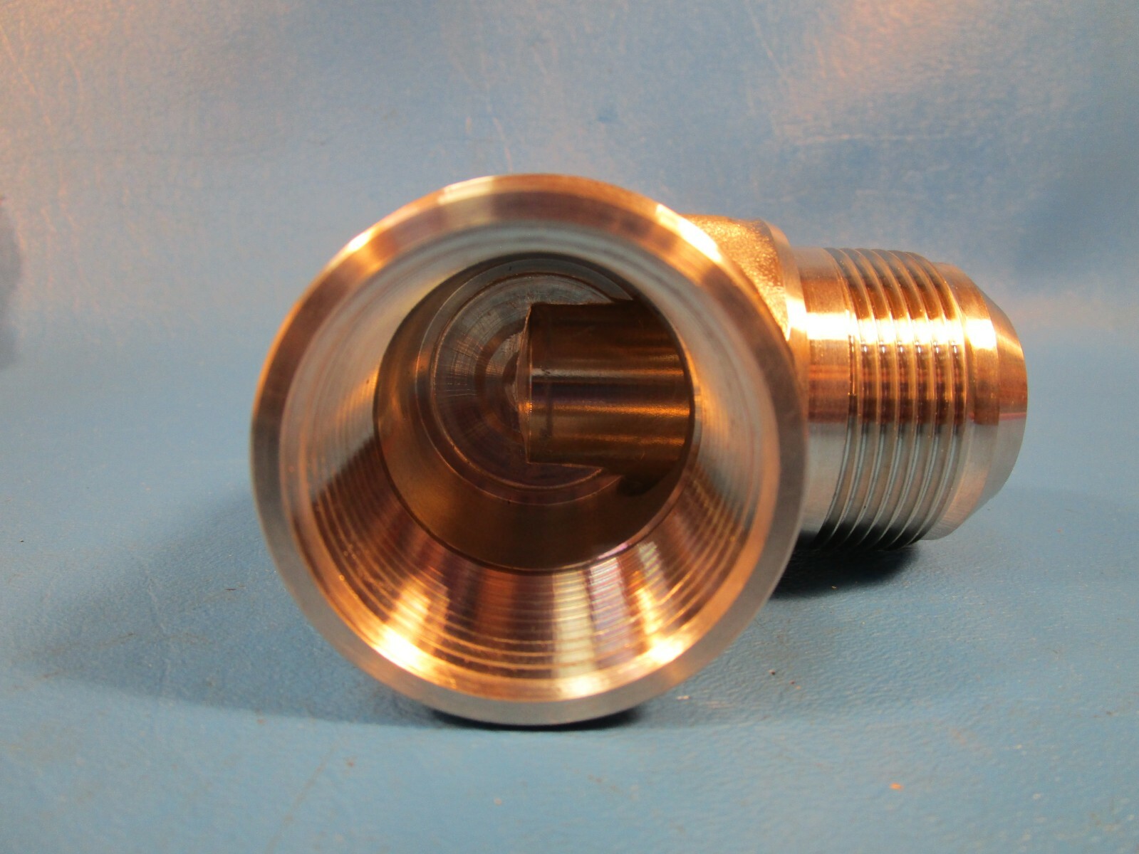 Brennan 2502-20-20SS, 90 Degree Elbow 1 1/4″ Female Pipe x 1 1/4 Male Flare