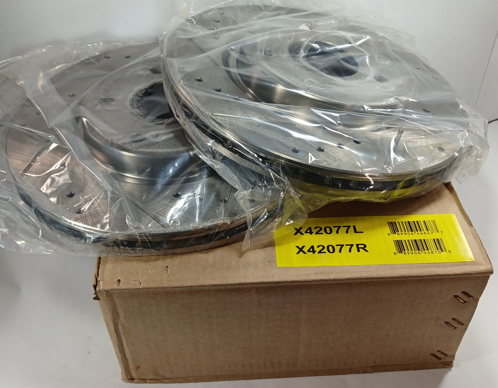 1 NEW SET UNBRANDED X42077L/R DRILLED AND SLOTTED BRAKE ROTORS NIB *MAKE OFFER*