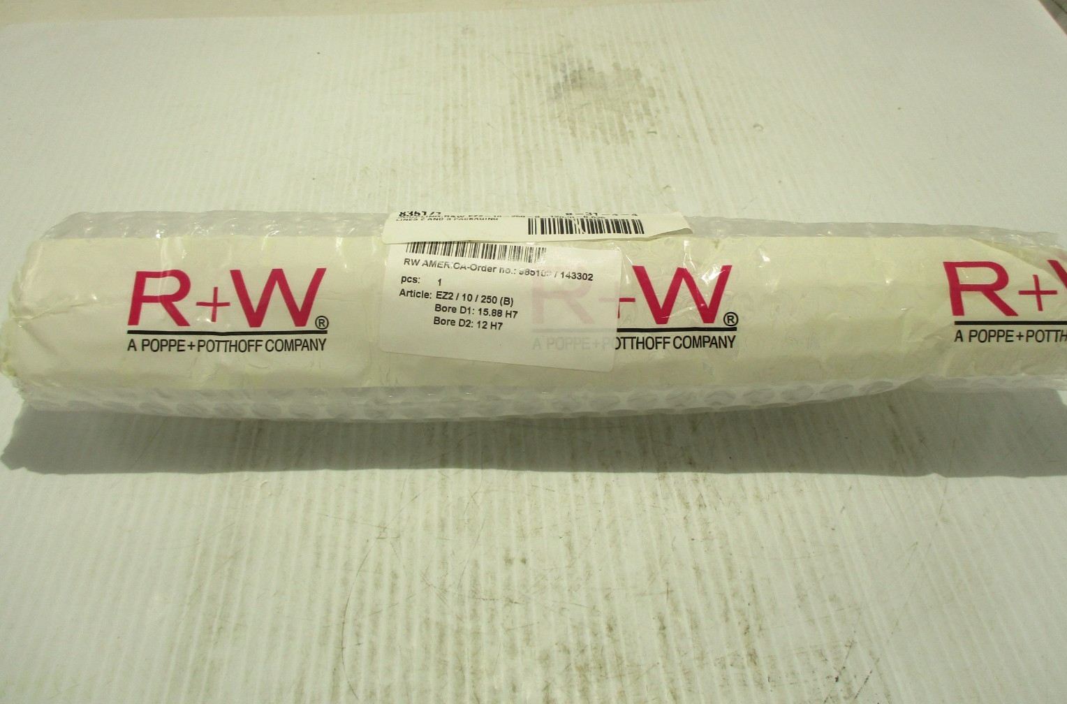 NEW R&W EZ2-10-250-B ELASTOMER COUPLER BORE D1-15.88MM (0.625) D2-12MM 9-7/8″