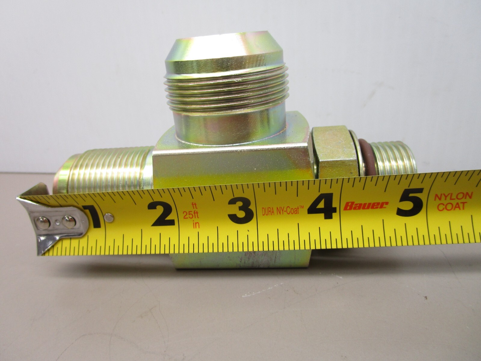 New Flyer 115509 Hydraulic Relief Valve Tee 65PSI 1″ ORB x 1-1/4″ x 1-5/8″ JIC