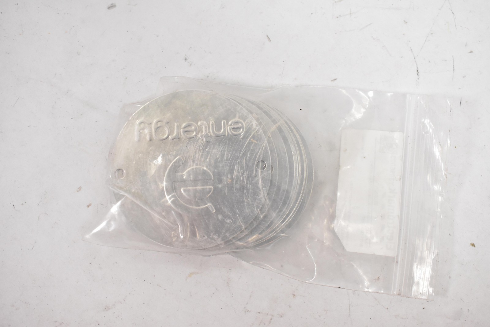 Electromark Y3995023 TG AL 3×3 Embossed Aluminum Entergy Round Tags 25 Pack